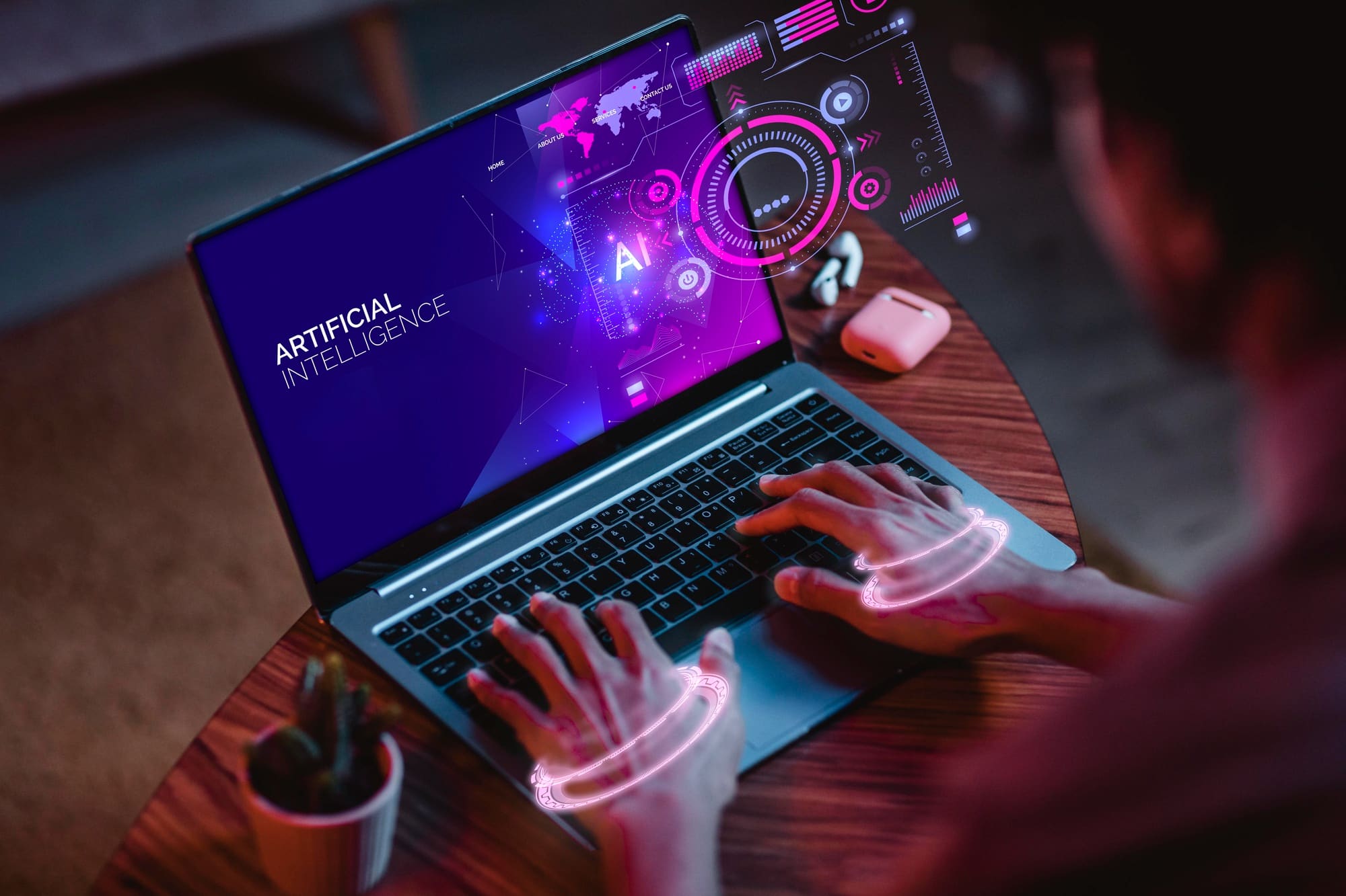 Hands typing on a laptop displaying an artificial intelligence interface