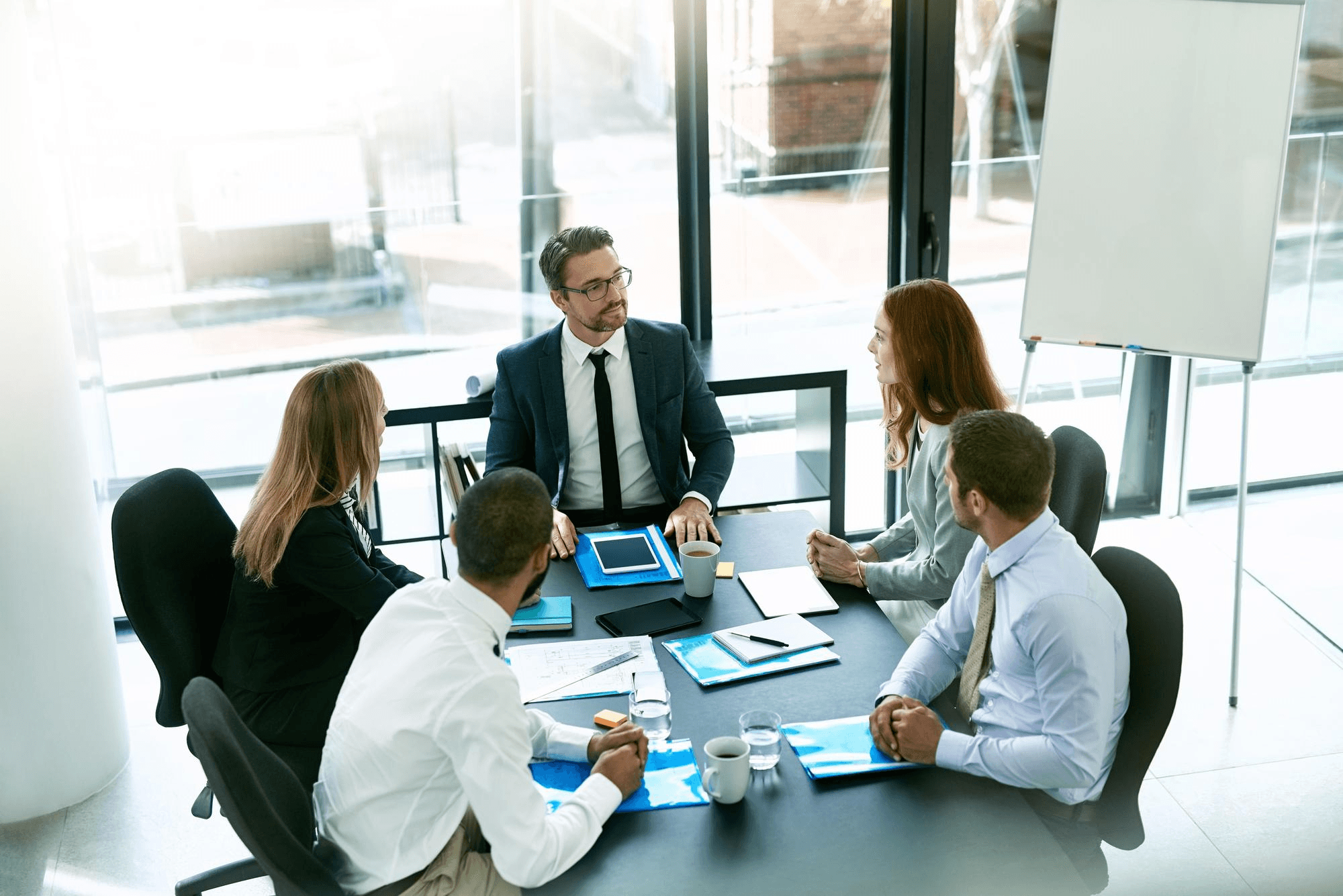 Healthcare compliance training session in a boardroom
